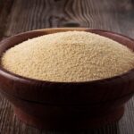 Cassava flour in the bowl _ Premium Photo